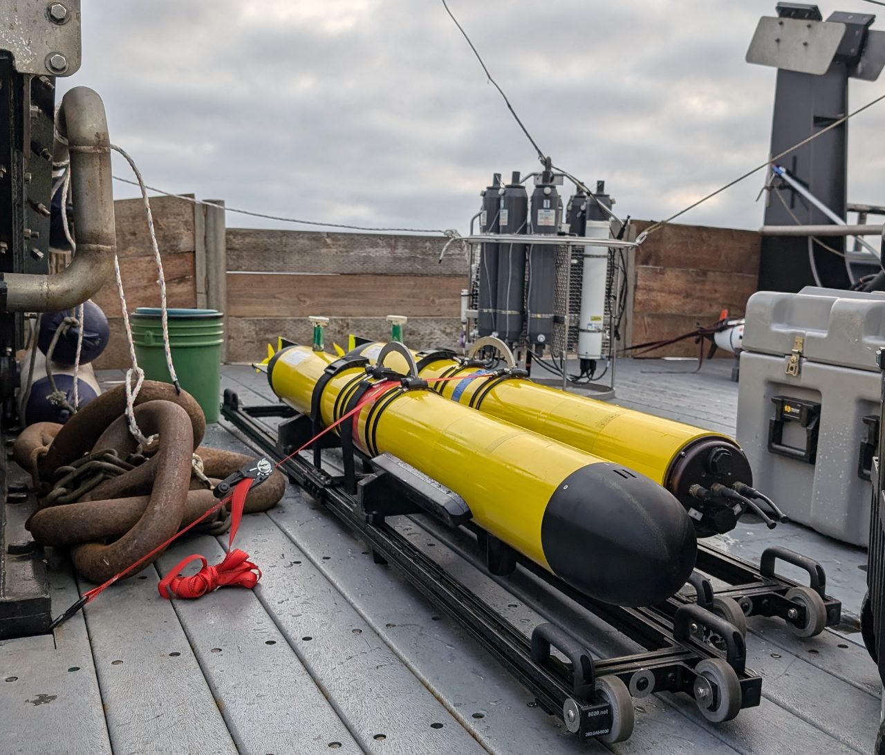 A pair of 690 AUVs onboard the R/V Pacific Storm, waiting to hunt for methane seeps